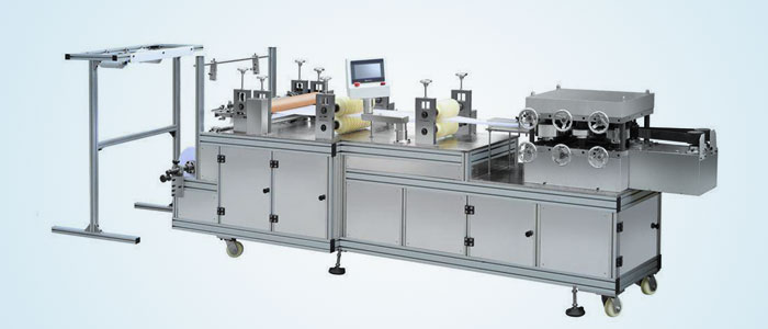 Plastic & Non Woven Cap Making Machine